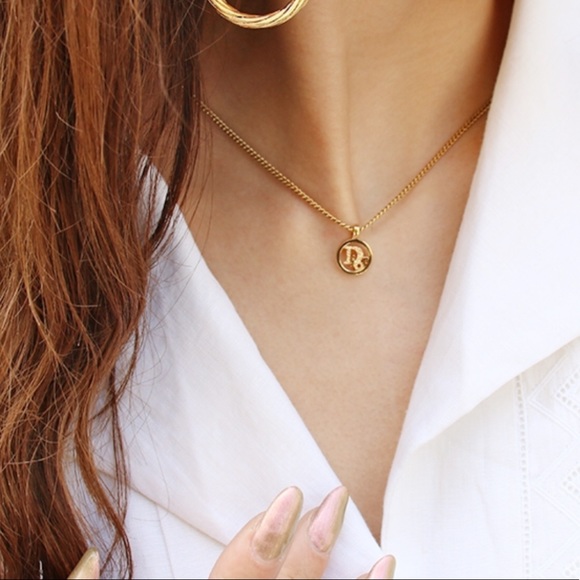 cd necklace dior